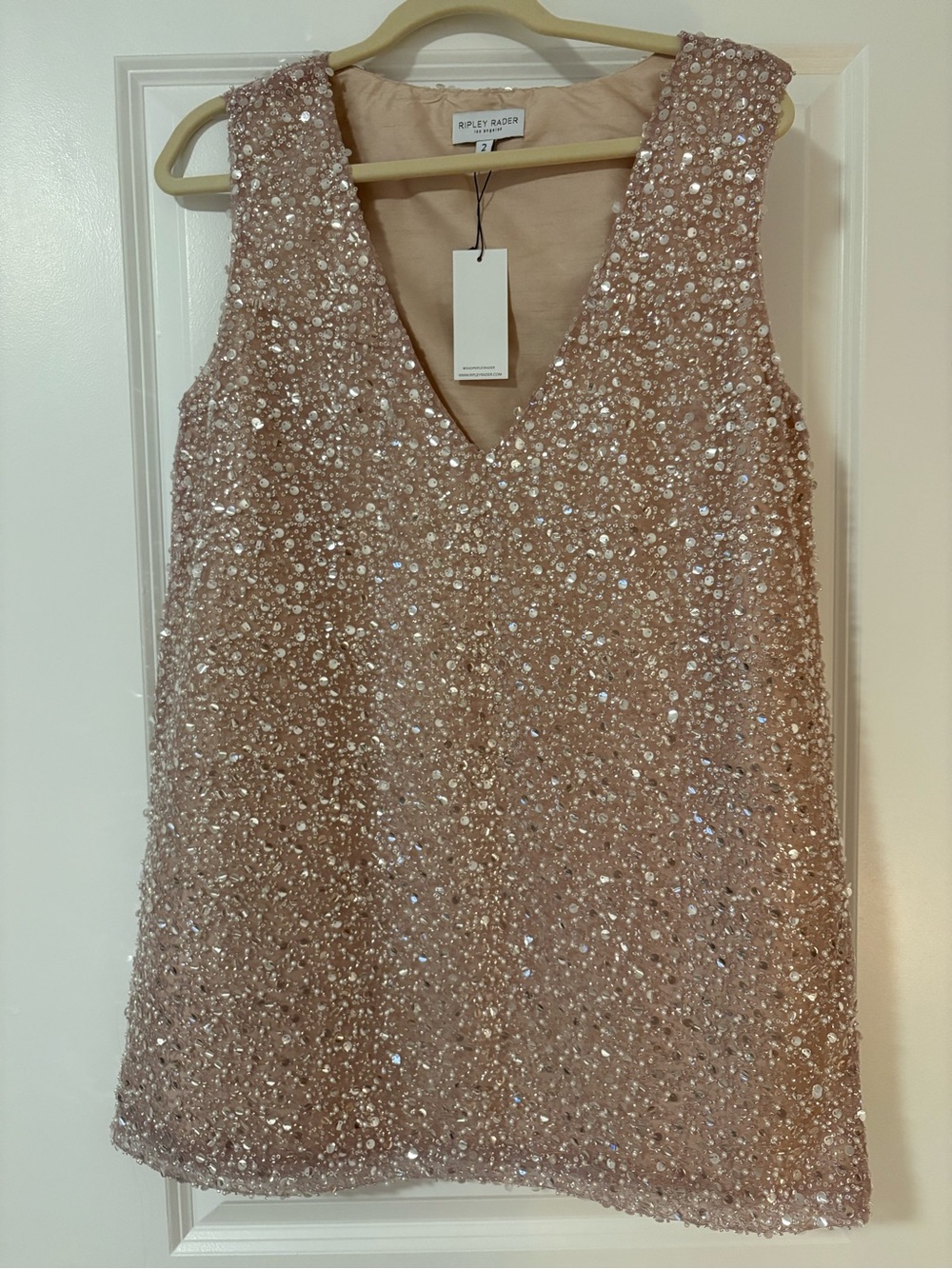 Ripley Rader is Rose Gold Sequin V-Neck Dress
